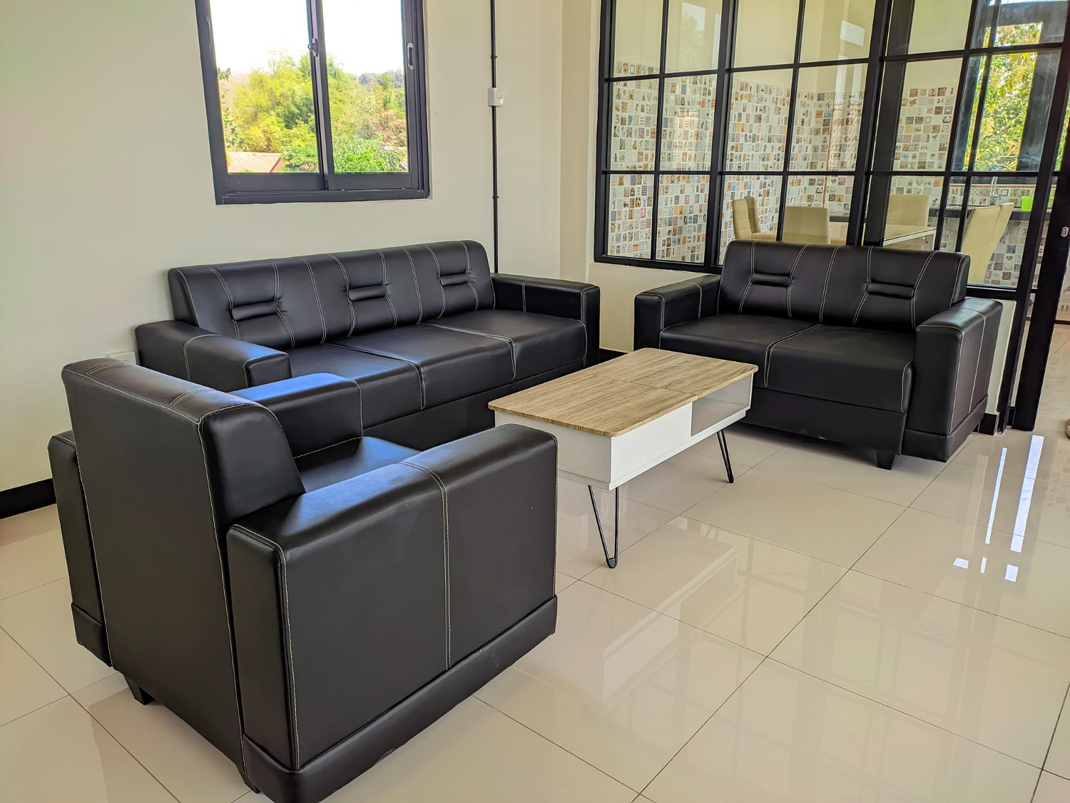 Professional black sofa set in a modern office